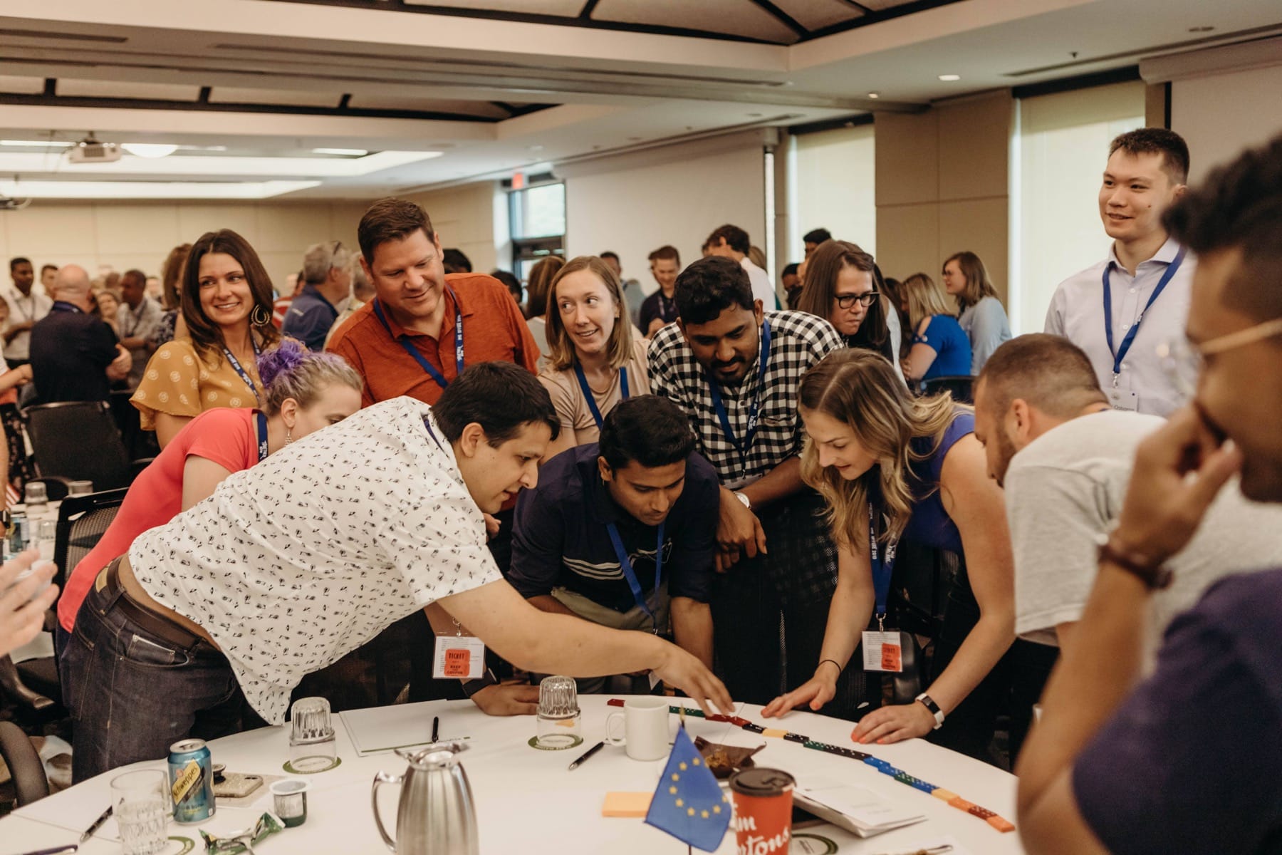 Raise team members collaborating in a group problem-solving session, demonstrating the self-management practices central to their Teal Operating System. Photo credit: Raise Recruiting