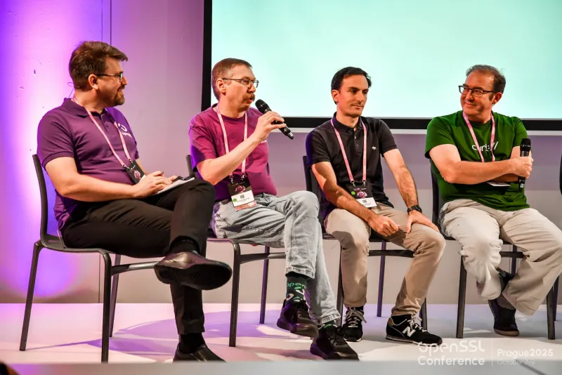 OpenSSL conference panel discussing on stage